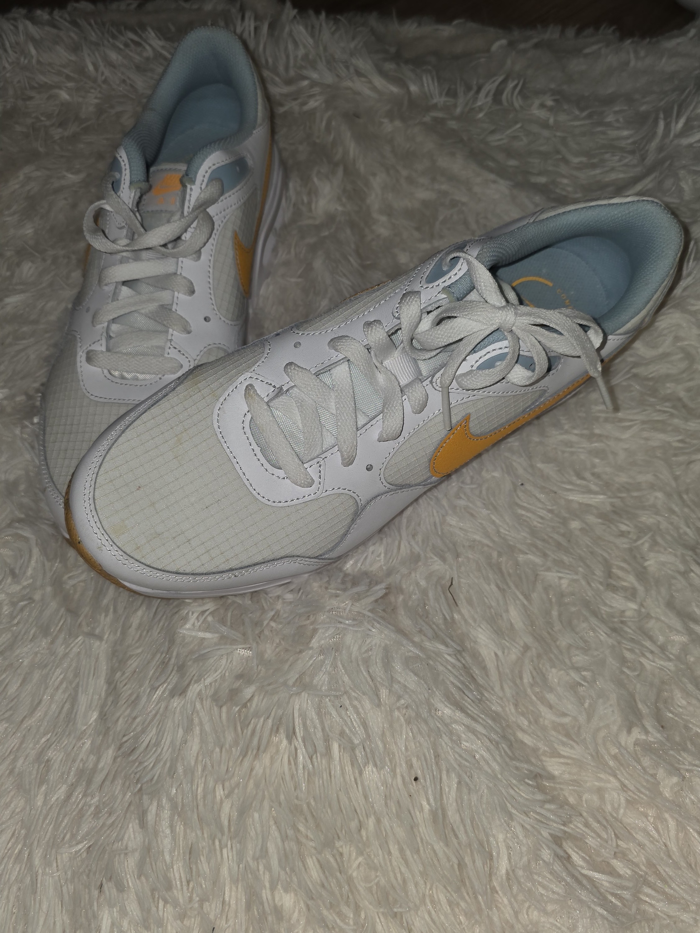 Nike White Running Shoes With Yellow Swoosh And Light Blue Lining
